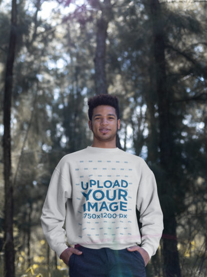 Mockup of a Smiling Man Looking into the Camera Wearing a Crewneck Sweatshirt
