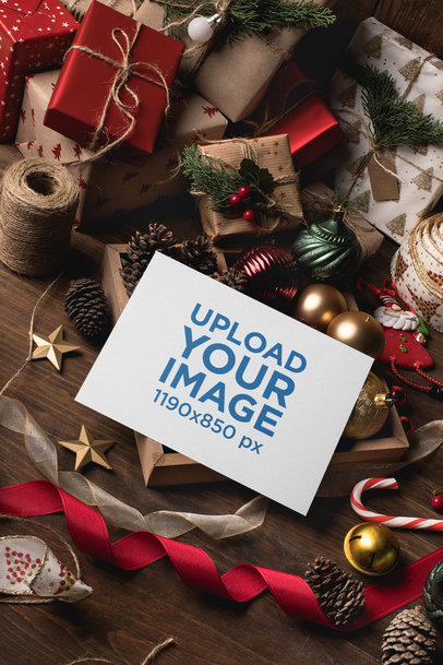 Mockup of a Xmas Greeting Card Surrounded by Christmas Ornaments
