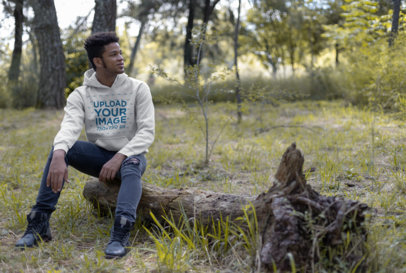 Mockup of a Man Wearing a Hoodie and High Top Sneakers Outdoors 23195