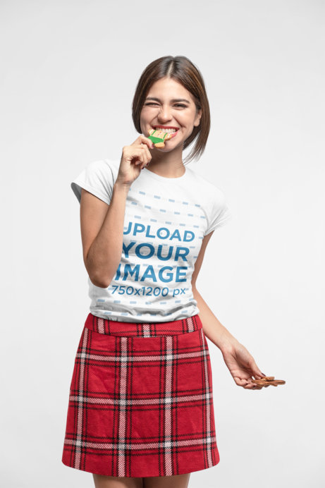 Christmas T-Shirt Mockup of Smiling Woman in Studio