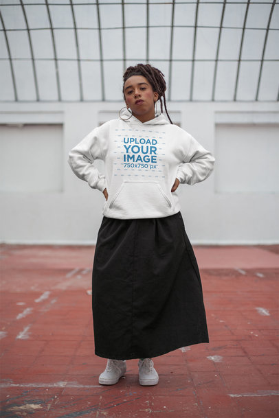 Mockup of a Woman with Locs Wearing a Pullover Hoodie