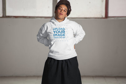 Mockup of a Girl with Locs Wearing a Pullover Hoodie Inside a Room 23425