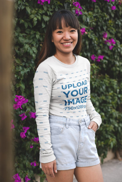 Mockup of a Smiling Woman Wearing a Long Sleeve Tshirt