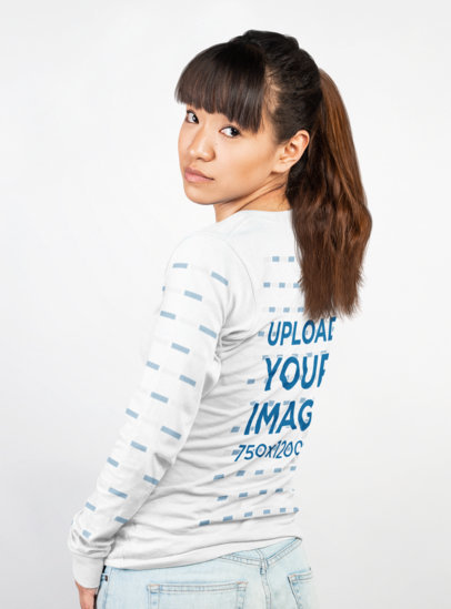 Long Sleeve T-Shirt Mockup of a Woman Looking Back in a Photo Studio