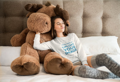 Crewneck Sweater Mockup of a Girl Cuddling with a Large Stuffed Animal 23208