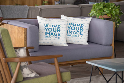 Mockup of Two Square Pillows on a Sofa