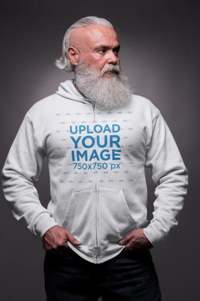 Mockup of an Older Man Wearing a Zip Up Hoodie in a Studio