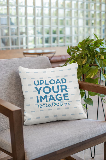 Mockup of a Pillow on an Armchair