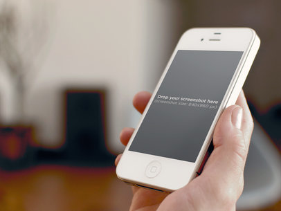 Holding White iPhone 4 Room