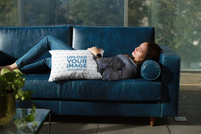 Pillow Mockup of a Woman Chilling on a Sofa in Her Apartment