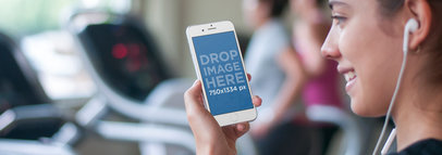 iPhone 6 Mockup Template of a Young Lady at the Gym