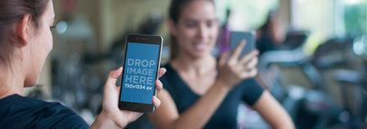 iPhone 6 Mockup Template of a Woman at the Gym