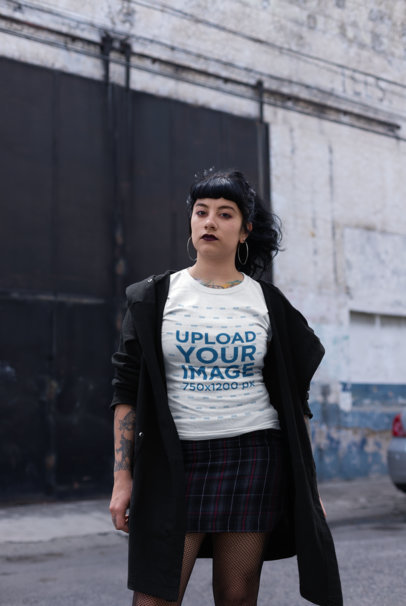 T-Shirt Mockup of a Goth Woman Standing in an Urban Scenario