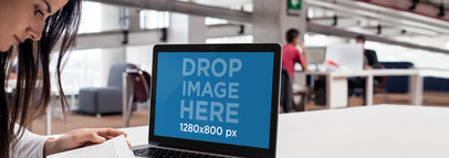 Macbook Mockup of a Young Lady Studying at the University