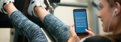 iPhone 7 Mockup Template of a Young Woman at the Gym