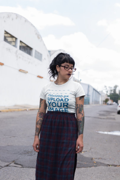 Mockup of a Somber Goth Woman Wearing a Tee and a Long Skirt