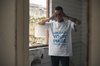T-Shirt Mockup of a Punk Man Covering His Eyes