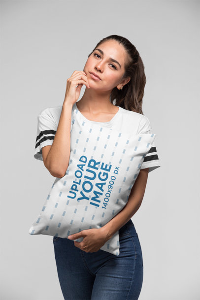 Pillow Mockup of a Woman Holding a Pillow in a Studio 23673