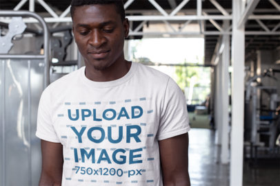 Tee Mockup of a Handsome Man at the Gym