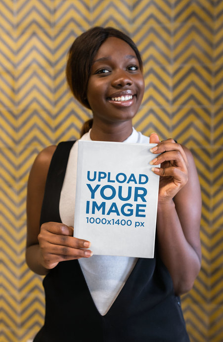 Book Mockup Featuring a Happy Woman 