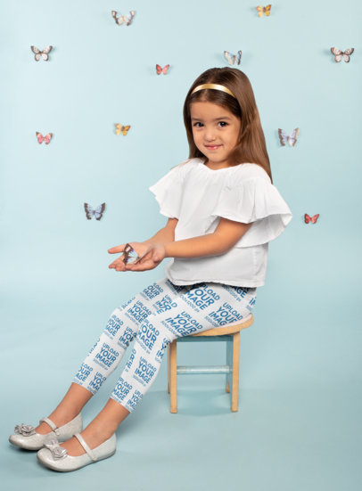 Leggings Mockup Featuring a Little Girl Holding a Butterfly 23907