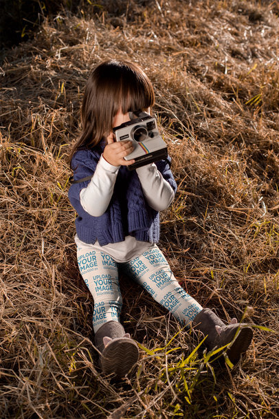 Legging Mockup of a Little Girl Playing with a Polaroid 23937
