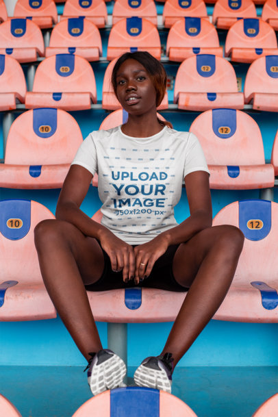 Sports Jersey Mockup of a Woman Sitting on a Stadium