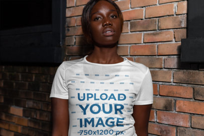 Sports Jersey Mockup Featuring a Serious Young Woman Ready to Work Out