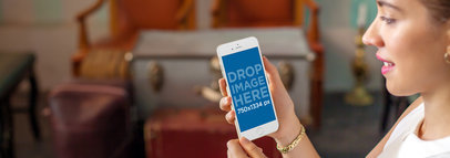 Young Lady Using iPhone 6 at a Furniture Store Mockup