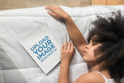 Book Mockup of a Beautiful Little Girl Sleeping