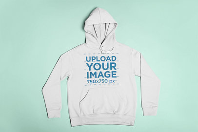 Pullover Hoodie Mockup Lying on a Flat Surface