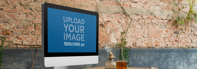 Mockup of an iMac at a Creative Office
