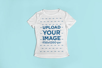 Fitness Mockup of a Women's Sports Jersey Lying Over a Surface