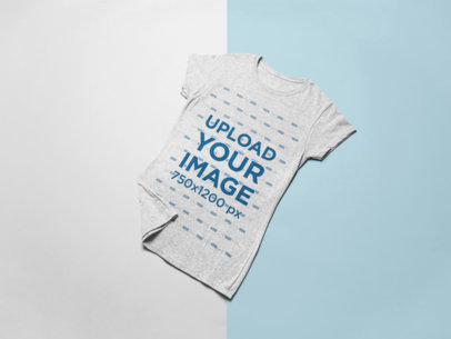 Mockup of a Tee Lying Frontwards Over a Surface 24293