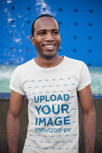 Tee Mockup of a Smiling Man with a Buzz Cut