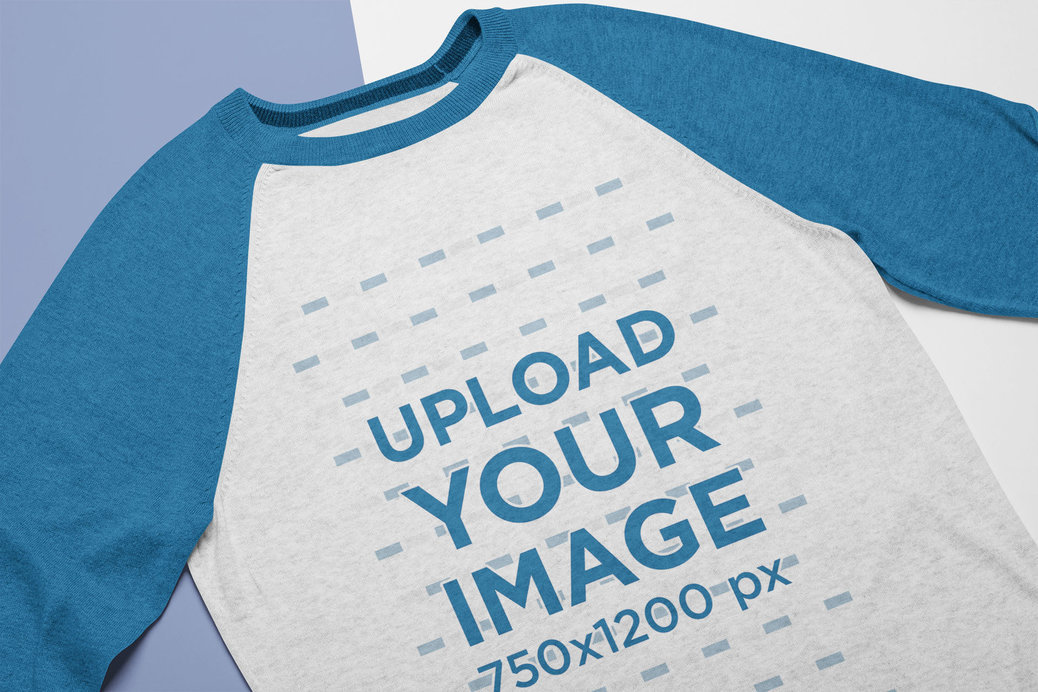 Mockup of a Crew Neck Heathered Raglan T-Shirt Lying on a Flat Surface