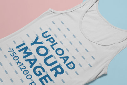 Flat Lay Mockup of a Tank Top Over a Background with Two Colors