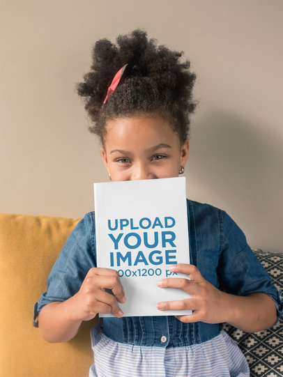 Book Mockup of a Child on a Sofa 23723