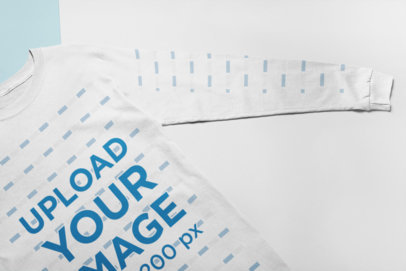 Mockup of a Long Sleeve Tee on a Flat Surface
