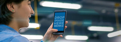 Mockup of an HTC One M8 Phone Being Held by a Young Woman