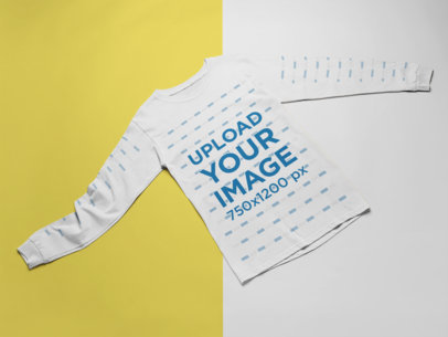 Flat Lay Mockup of a Long Sleeve Tee over a Custom Background
