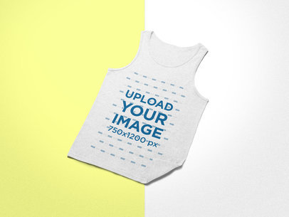 Mockup of a Tank Top Lying Over a Background with Two Colors 24224