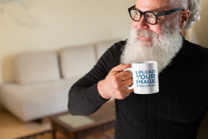 Coffee Mug Mockup Featuring a Hipster Man with a Big Beard
