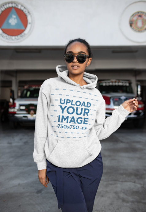 Heather Hoodie Mockup of a Cool Woman at a Parking Lot