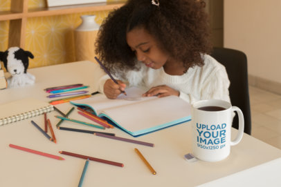 Mug Mockup of a Beautiful Little Girl Coloring Her Book 23905