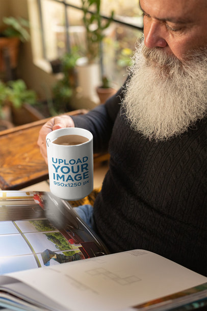 15 oz Mug Mockup of a Man Drinking Tea and Reading a Book