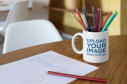 Mockup of a Coffee Mug Used as a Pencil Holder
