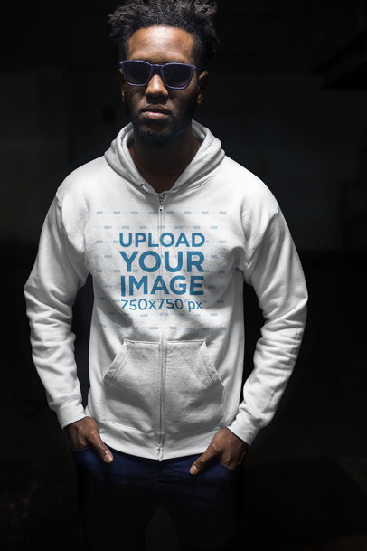 Mockup of a Man Wearing a Hoodie in a Dark Surrounding 24320