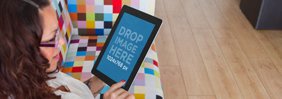 Female Designer Using an iPad at a Design Studio Mockup a5109