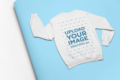 Mockup of a Crewneck Sweatshirt Lying on a Pasteboard 24382